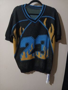 Men's Black V-Neck Sweater with Blue Number 23 and Gold Flame Accents Size Med